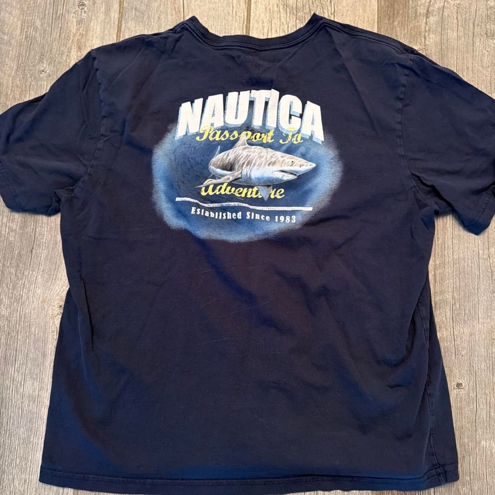 Nautica navy blue t-shirt with shark graphic and 'NAUTICA